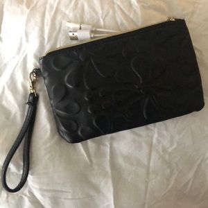 Wristlet with charging port